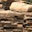 Cut stone stacked on pallets, ready to transport.