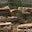 Wide angle of cut stone stacked on pallets, ready to transport.